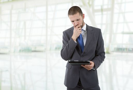 businessman using touch pad of tablet pc, at the office