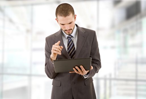 businessman using touch pad of tablet pc, at the office