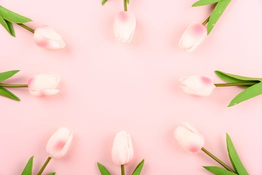 Happy Women's Day, Mother's Day concept. top view flat lay Tulip flower on pink background, copy space for your text