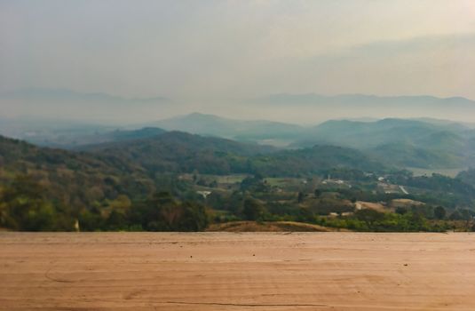 The landscape of mountains is full of clouds and fog. A top view of the haze in the mountains And fog in the morning at Doi Sako Mountain, Chiang Saen, Thailand