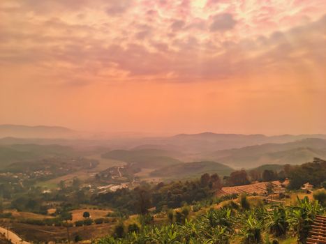 The landscape of mountains is full of clouds and fog. A top view of the haze in the mountains And fog in the morning at Doi Sako Mountain, Chiang Saen, Thailand