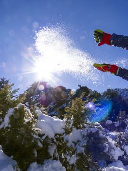 Playing with snow at Ziria mountain covered with snow on a winter day, Korinthia, South Peloponnese, Greece. Ziria is one of the snowiest mountains in Peloponnese (2,374m).