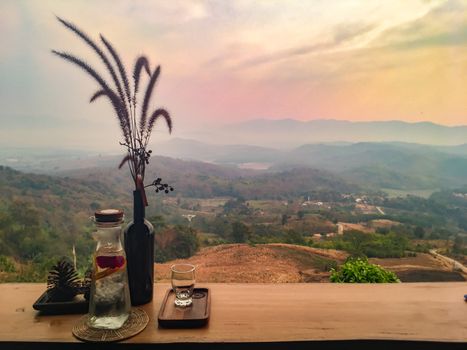 The landscape of mountains is full of clouds and fog. A top view of the haze in the mountains And fog in the morning at Doi Sako Mountain, Chiang Saen, Thailand