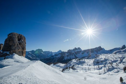 Dolomities Dolomiti Italy in wintertime beautiful alps winter mountains and ski slope Cortina d'Ampezzo Cinque torri mountain peaks famous landscape skiing resort area