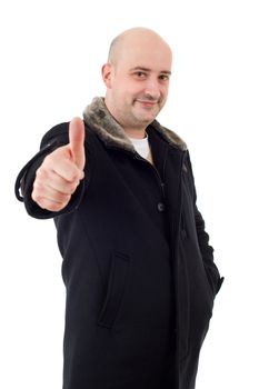 Young casual man going thumbs up, isolated on white background