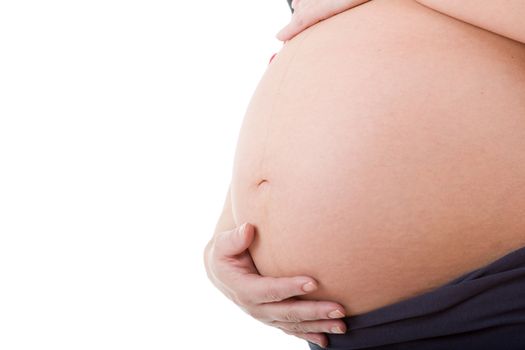 Closeup of pregnant woman at white background