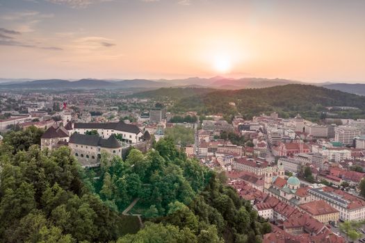 Aerial panorama of Ljubljana, capital of Slovenia, at sunset.