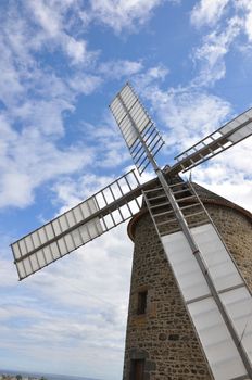 windmill in the countryside, France. miller's habitat for making flour