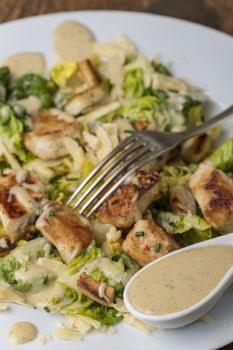 overview of a caesar salad on a plate