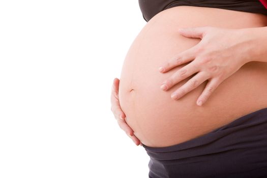 Closeup of pregnant woman at white background