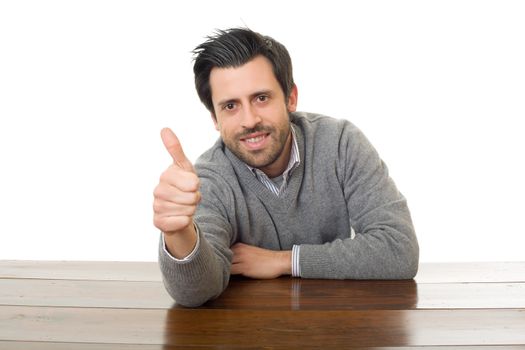 happy man going thumb up, on a desk, isolated