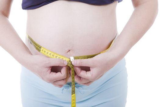 Closeup of pregnant woman at white background