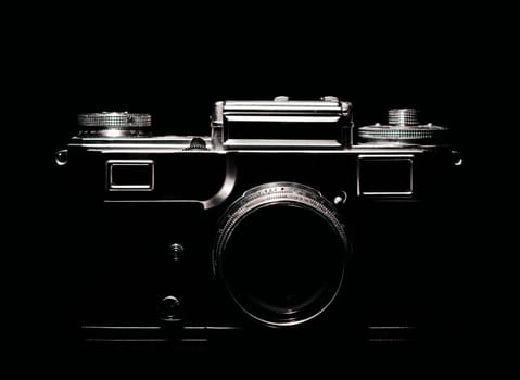 vintage camera silhouette in the dark