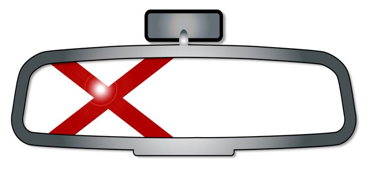 A vehicle rear view mirror with the flag of the state of Alabama