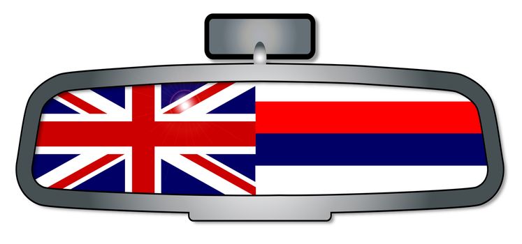 A vehicle rear view mirror with the flag of the state of Hawaii