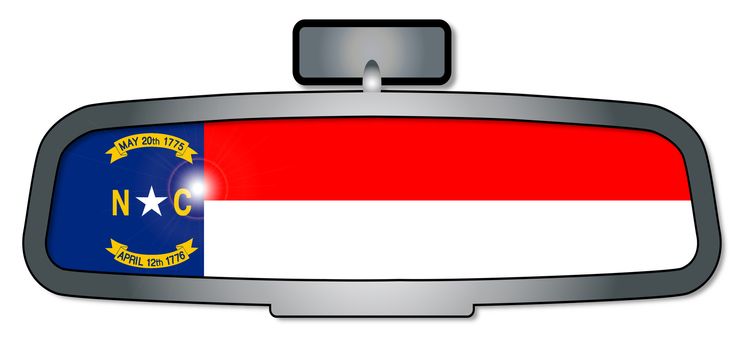 A vehicle rear view mirror with the flag of the state of North Carolina