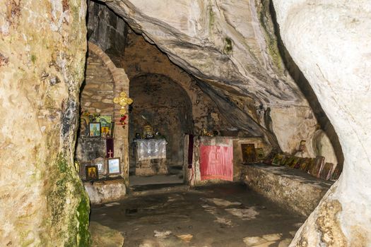 Inside the monastery enclosed by Davelis cave in Penteli, a mountain to the north of Athens, Greece.