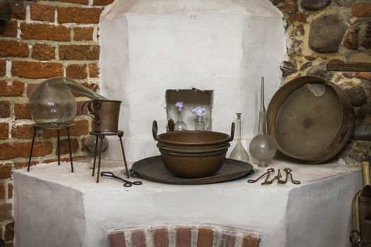 Old alchemy workshop with many equipment