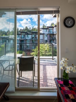 Nice view throgh open patio door on residential neighbourhood