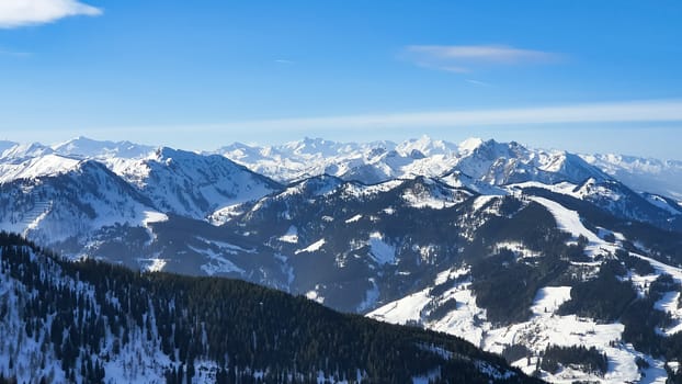 Snowy Alps in Austria During Winter Against A Blue Sky