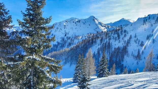 Snowy Alps in Austria During Winter Against A Blue Sky