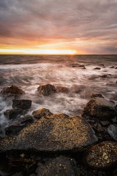 Tempest on the shore: Rough seas along the Whitehead shoreline at dawn.