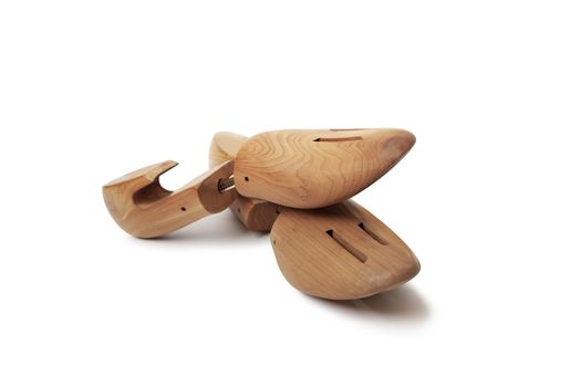 A Shoe tree made from cedar from the Woodlore company isolated on a white background. With clipping path