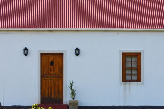 The front exterior of a simple small town cottage, Mossel Bay, South Africa