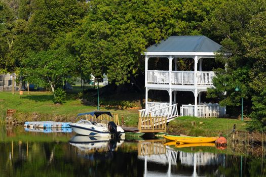 A luxury riverside pavilion with motorboat and kayaks, Mossel Bay, South Africa