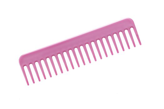 Pink hair comb isolated on a white background