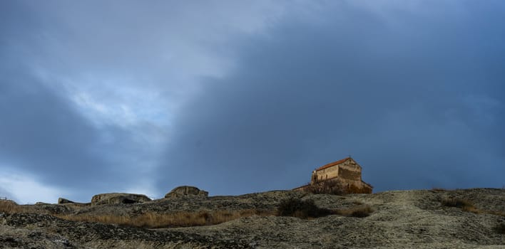 04 DECEMBER 2019: Ruins of ancient rock city Uplistsikhe close to Gori in  Shila Kartli region, Georgia, One of the most famous landmark of Georgia