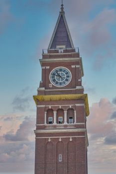 A classic old brick clock tower over a Seattle train station