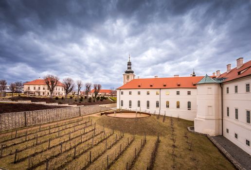 Walking Kutna Hora city center. Early baroque building of Jesuite College Jezuitska Kolej in Kutna Hora, Czech Republic