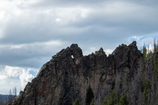 A sign on the side of a mountain. High quality photo