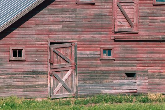 A wooden old red barn abandon building. High quality photo