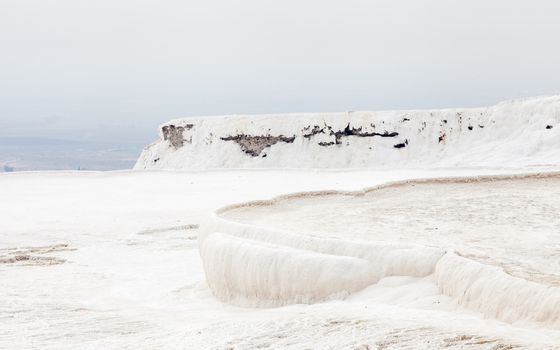 The view across the travertines of Pamukkale in southwestern Turkey.  The site is a UNESCO World Heritage Site.