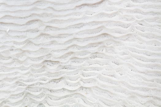 The view across a white travertine terrace in Pamukkale, southwestern Turkey.  The site is a UNESCO World Heritage Site.