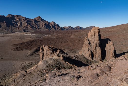 View to lava field and volcanic formation in Roques de Garcia area  in Teide National Park, Tenerife, Canary Islands, Spain. Panorama