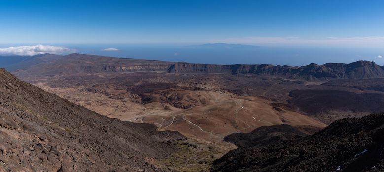 View from Teide то Las Canadas Caldera volcano with solidified lava and Montana Blanca mount. Teide national Park, Tenerife, Canary Islands, Spain. Panorama