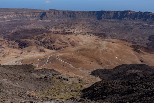 View from Teide то Las Canadas Caldera volcano with solidified lava and Montana Blanca mount. Teide national Park, Tenerife, Canary Islands, Spain.