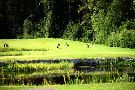 golf sport on a gold course in Switzerland with green grass