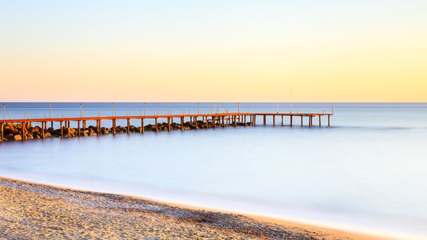 A long exposure of dusk over the Mediterranean Sea viewed from the southern Turkish coastline near Turkler.