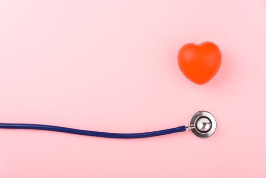 Doctor's Day concept, flat lay top view, equipment medical red heart and stethoscope on pink background, care patient in hospital with copy space for text