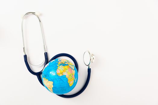 World health day concept, Stethoscope and globe on white background with copy space. Global health care