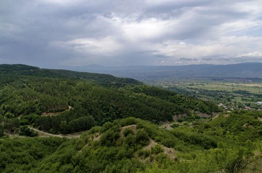 A view from the slope of the Stob Pyramids to the valley of the village of Stob, Rila mountain, Kyustendil region, Bulgaria, Europe