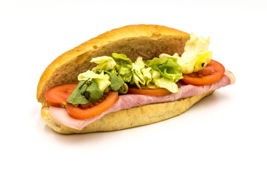 Belgian ham sandwich with salad and tomato on white background