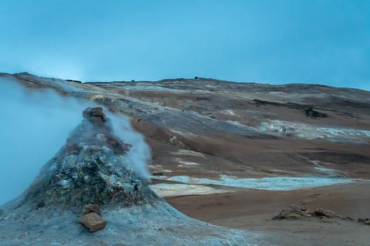Hverir volcano in Iceland sulfuric smoker emitting hot steam in front of the Namafjall