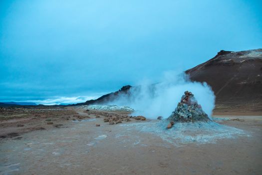 Hverir volcano in Iceland sulfuric smoker emitting very hot steam