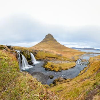Kirkjufell in Iceland Kirkjufellsfoss waterfall square panorama of fall and the famous mountain