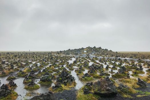 Laufskalavarda stone columns in Iceland during rain weather